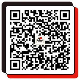二维码图像中间有一个标有“Doppel herz”的标志，周围是单色边框。该二维码可用于扫描以获取相关信息或链接。