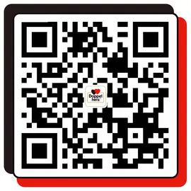 二维码图像，中心有“Doppelherz”标志，黑白相间，背景为黑色和红色方形。此二维码用于扫描，可能含有链接或信息。
